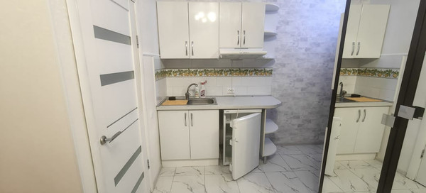 Купить --комнатную квартиру